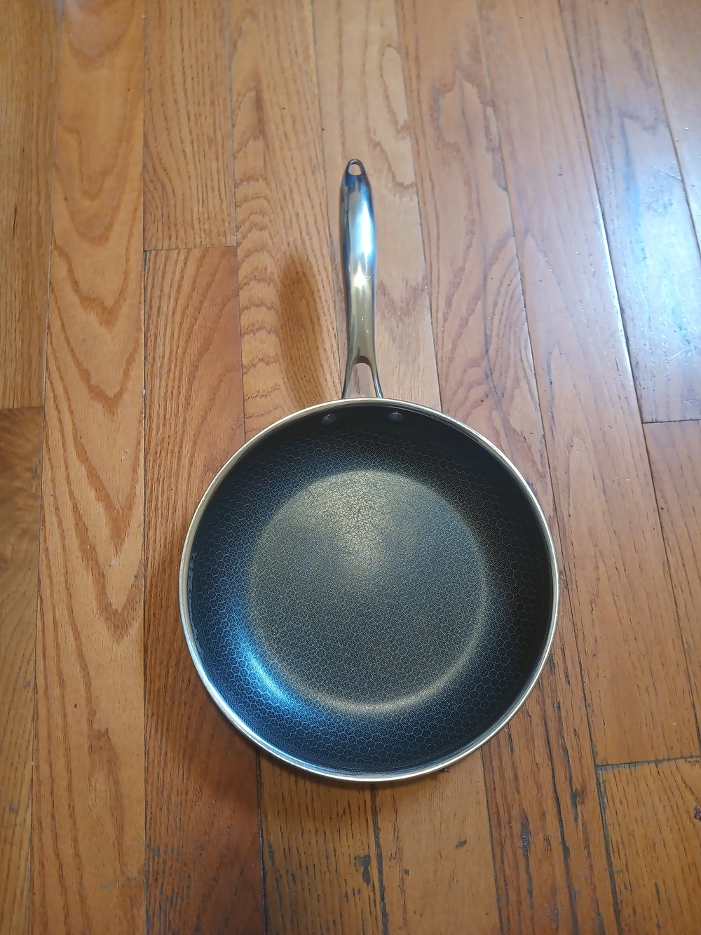Hexclad Black and Silver Nonstick Frying Pan with Stainless Handle